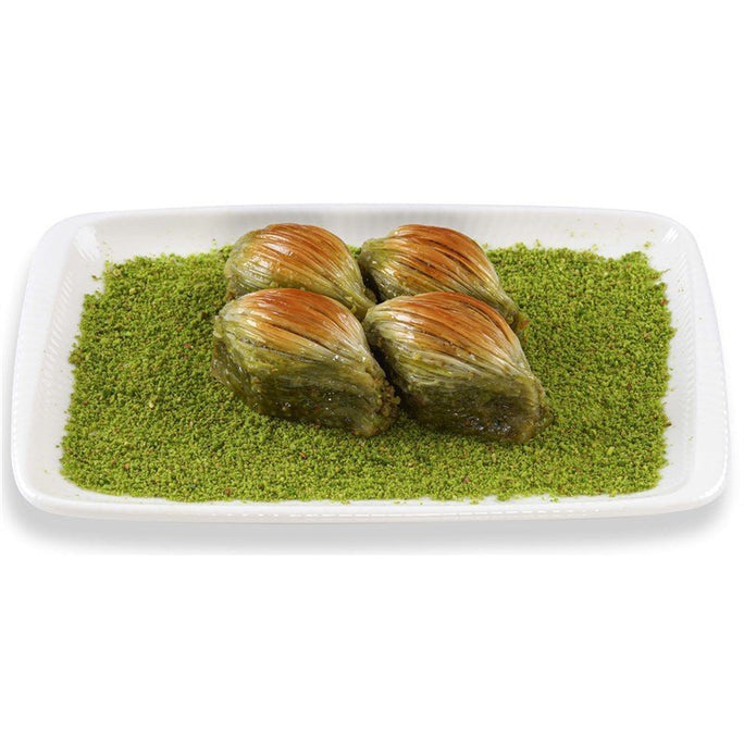//www.kuryemis.com/cdn/shop/files/antep-fistikli-midye-baklava-23_684x752.jpg?v=1698131594